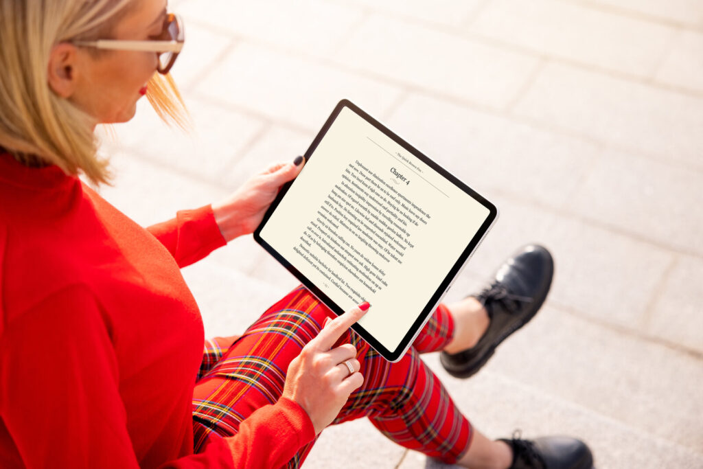 Person reading an article on a tablet